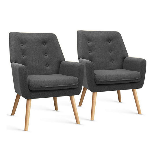 Pair of charcoal velvet retro armchairs with button-tufted backs and angled wooden legs, vintage style for Australian home.