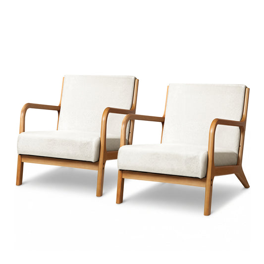 Pair of beige vintage-style armchairs with velvet-like faux fabric cushions and natural wood frames, showcasing.
