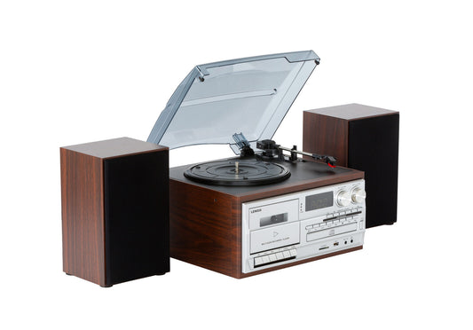 Retro vintage brown wood grain audio system with turntable, cassette player, and two speakers against white background.