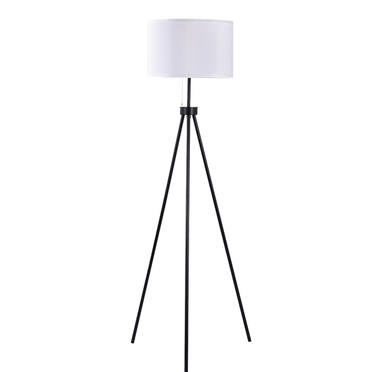 Mid-century modern tripod floor lamp with black wooden legs and white cylindrical fabric shade, vintage velvet texture.