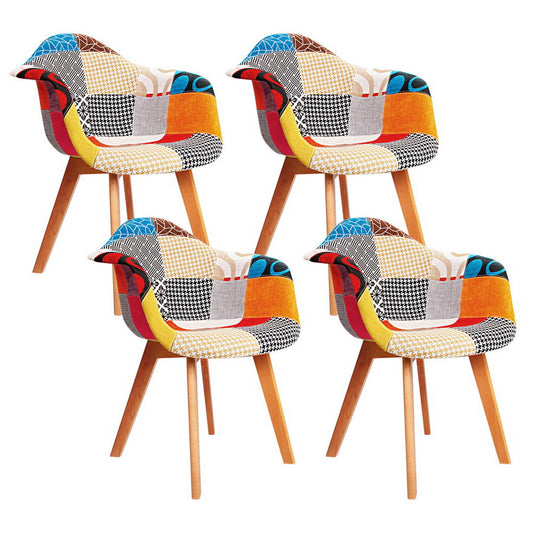 Set of 4 retro dining chairs with colorful patchwork velvet upholstery and angled beech wood legs for vintage home decor in.