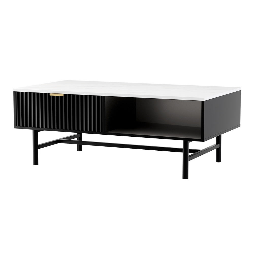 Black rectangular coffee table with a white top, featuring a slatted front drawer and open storage shelf, supported by.