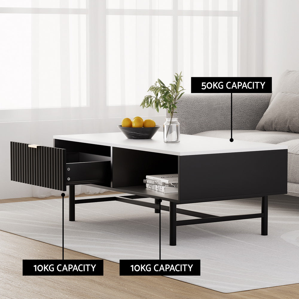 Black retro coffee table with white top, open shelf and side drawer showing 10kg capacity, set in bright living room with.