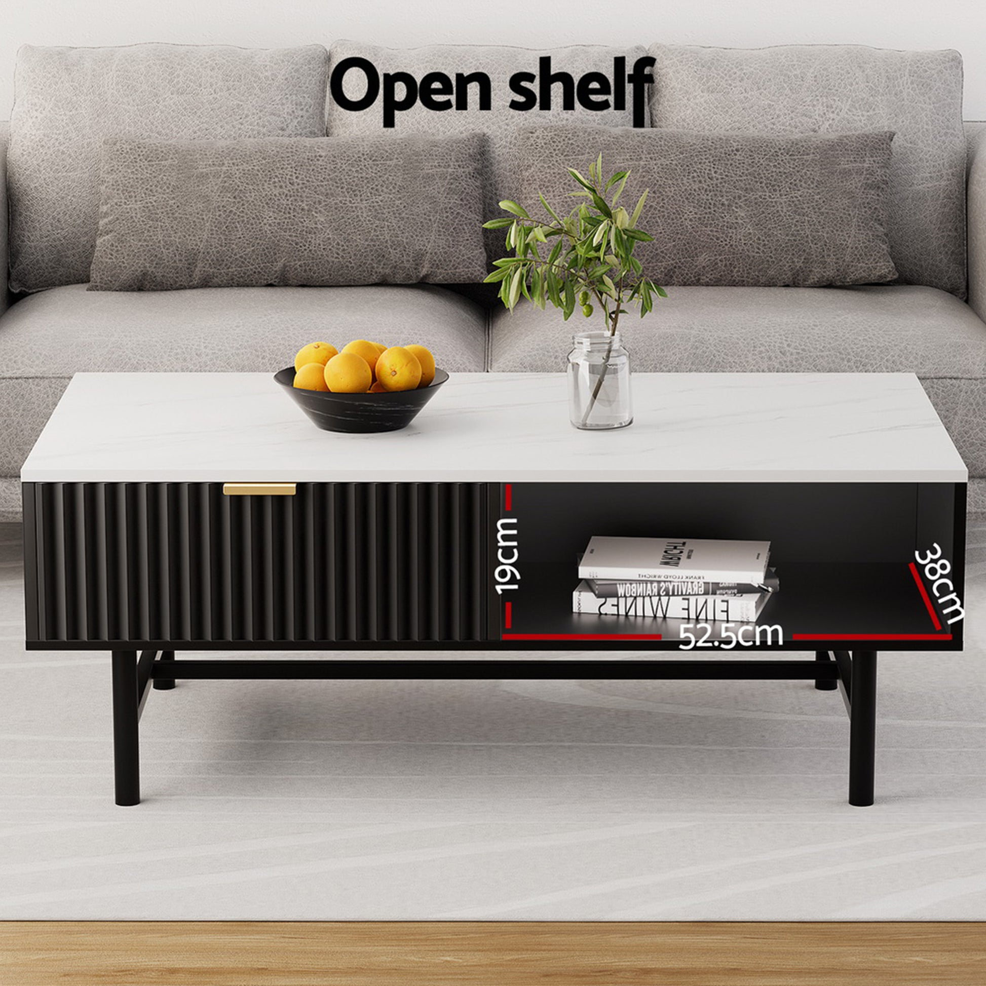 Black retro TV unit and coffee table set with vertical slats, open shelf displaying books, placed on light rug in front of.