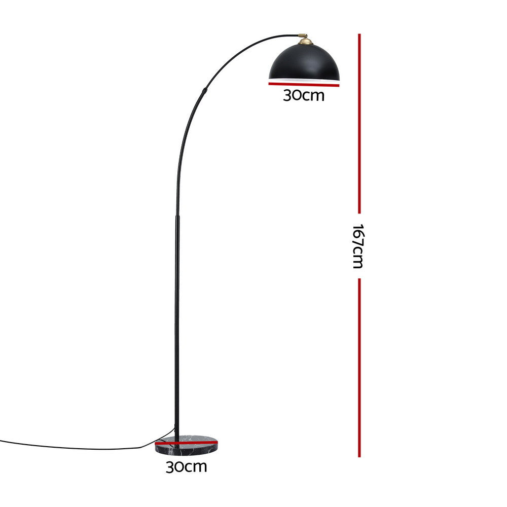 Black arched floor lamp with velvet dome shade and heavy-duty marble base, retro vintage style in modern living room decor,.