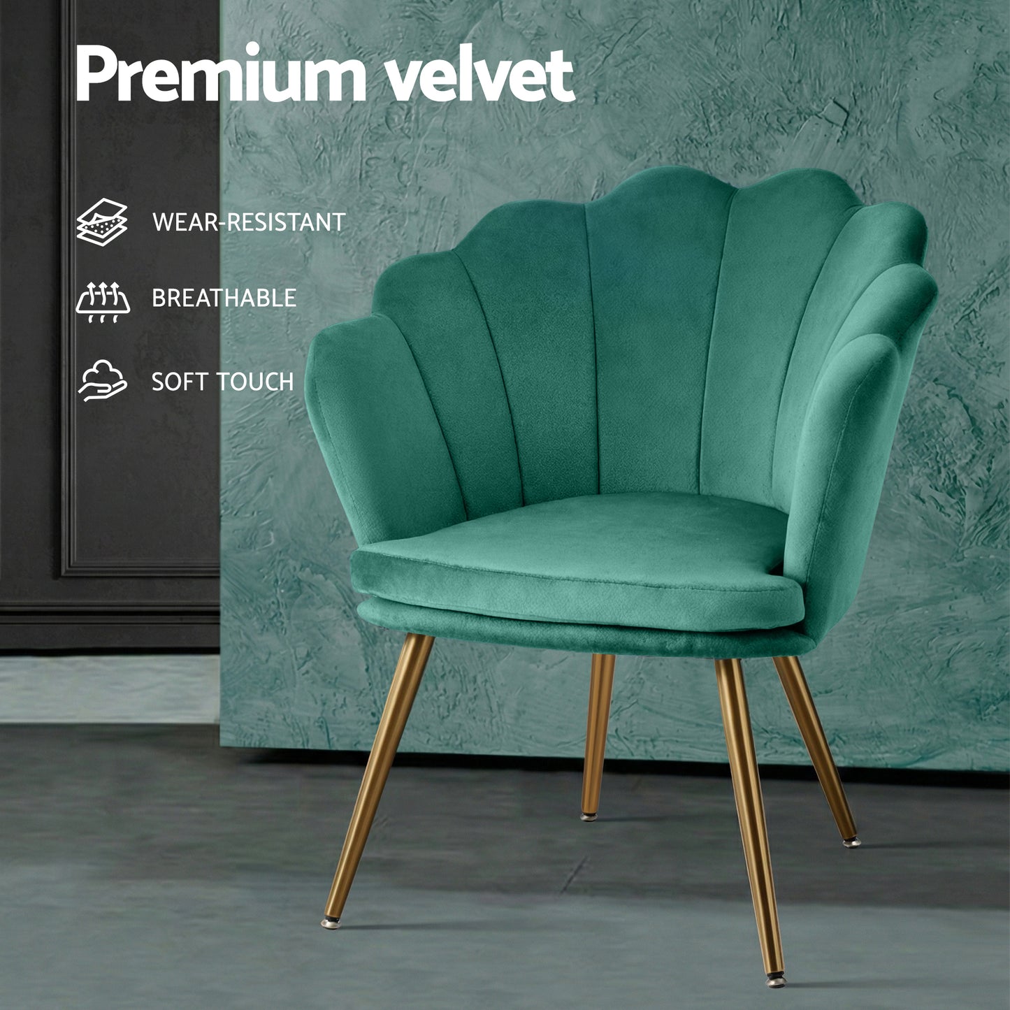 Green velvet retro armchair with scalloped shell-back design and gold tapered legs, set against grey and teal textured walls .