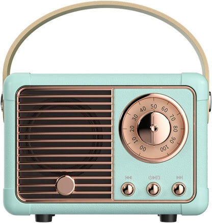 Vintage-style radio with turquoise casing and rose gold accents on a white background