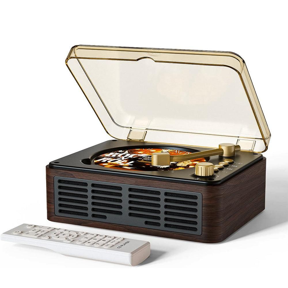 Wooden record player with glass lid and remote control on a white background