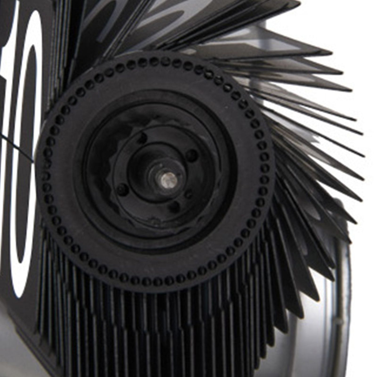 Close-up of a mechanical clock with gear details on a white background