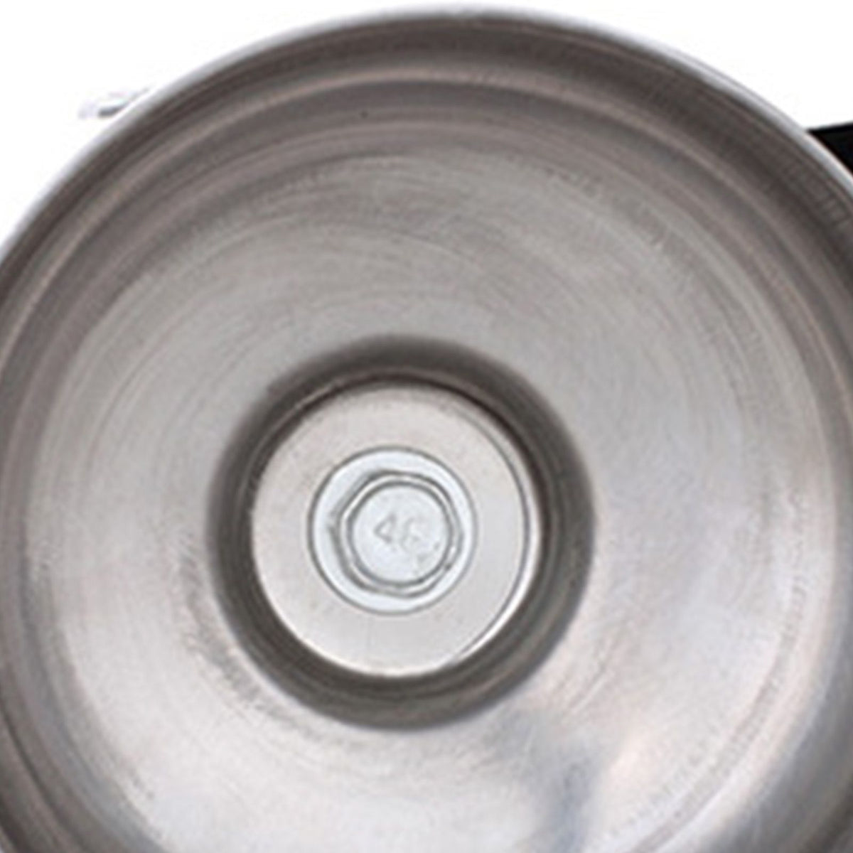 Close-up of a metallic surface with a central circular feature