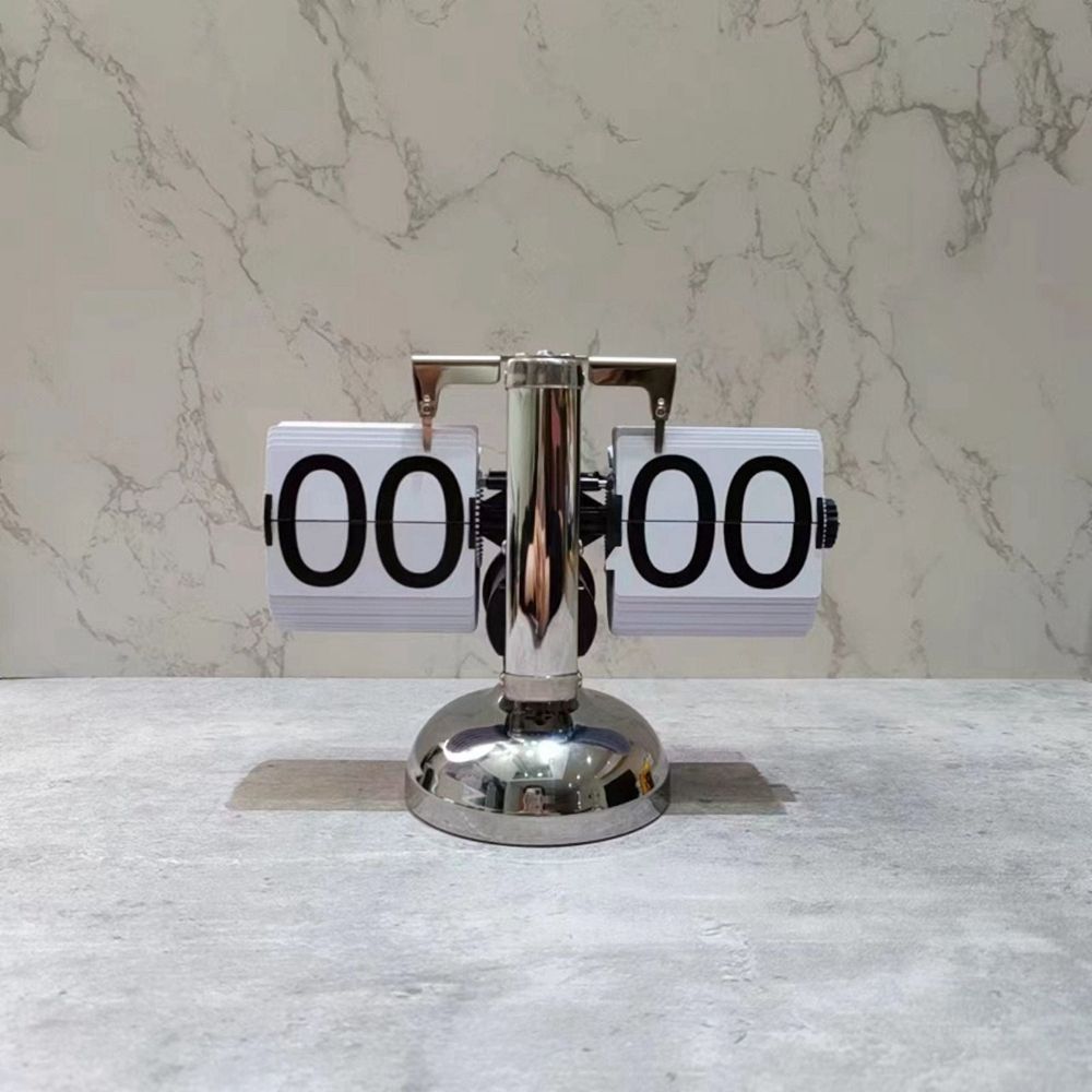 Flip clock on a marble surface