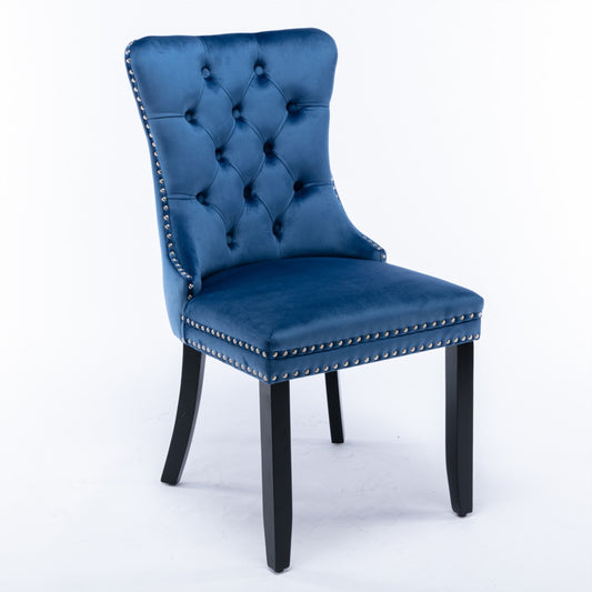 Blue velvet tufted wingback dining chair with silver stud trim and black solid wood legs, vintage retro style from Australia .
