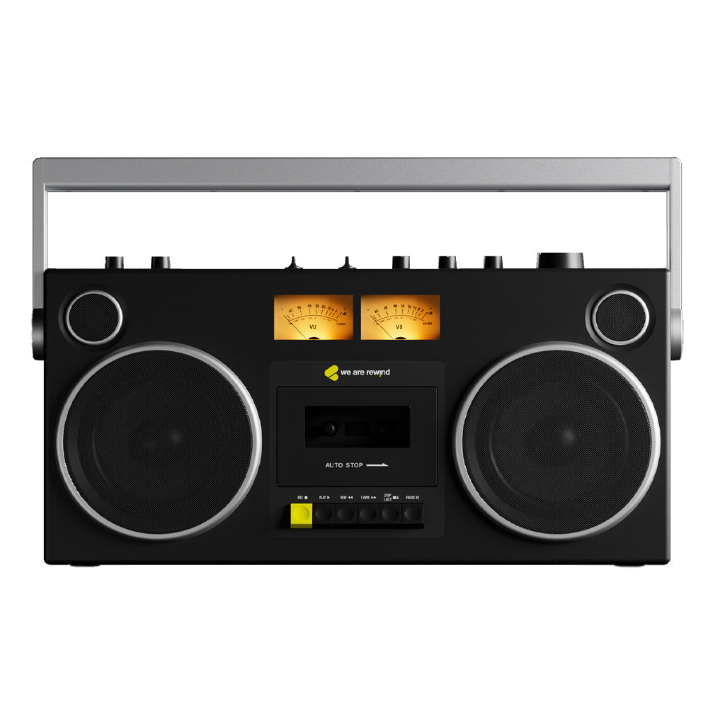 Black vintage-style We Are Rewind Getto Blaster cassette player with silver-trimmed speakers and illuminated meters, retro.