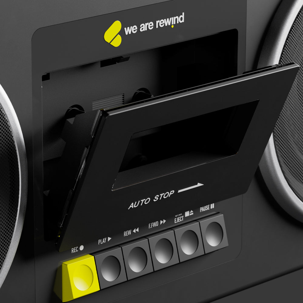 Close-up of black retro cassette player door open, yellow button and control panel with vintage style, part of We Are Rewind .