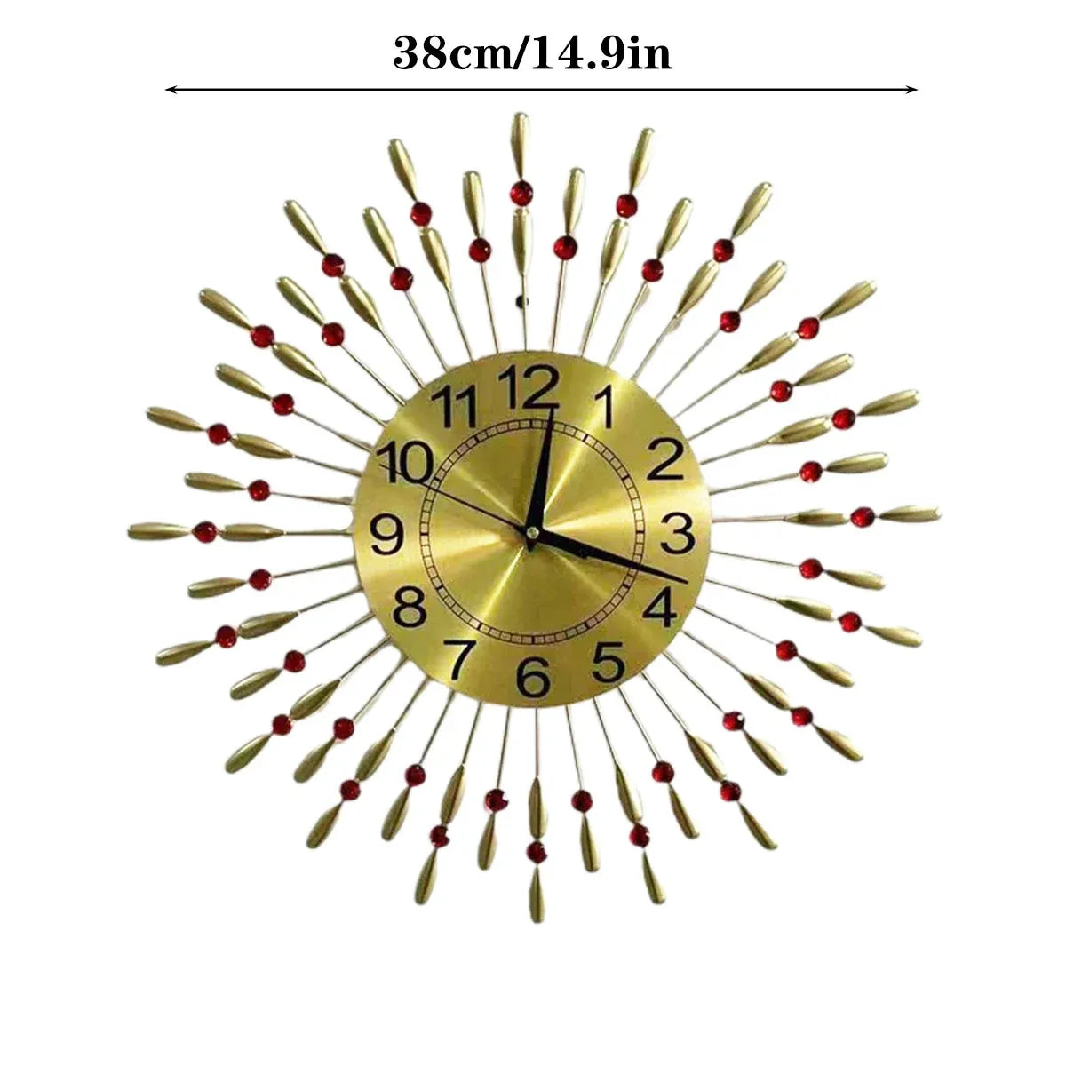 A retro-style wall clock with a gold-toned sunburst design, black numerals, and red bead accents, shown on a white background with a dimension label indicating 38cm/14.9in width.
