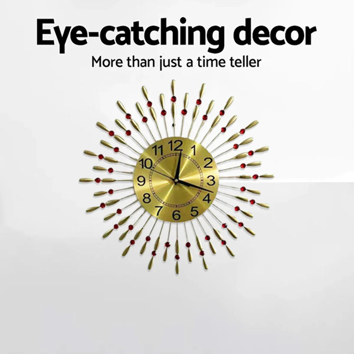A gold sunburst wall clock with black numerals and hands, decorated with small red beads along its radiating spikes, shown against a light gray background with promotional text above.